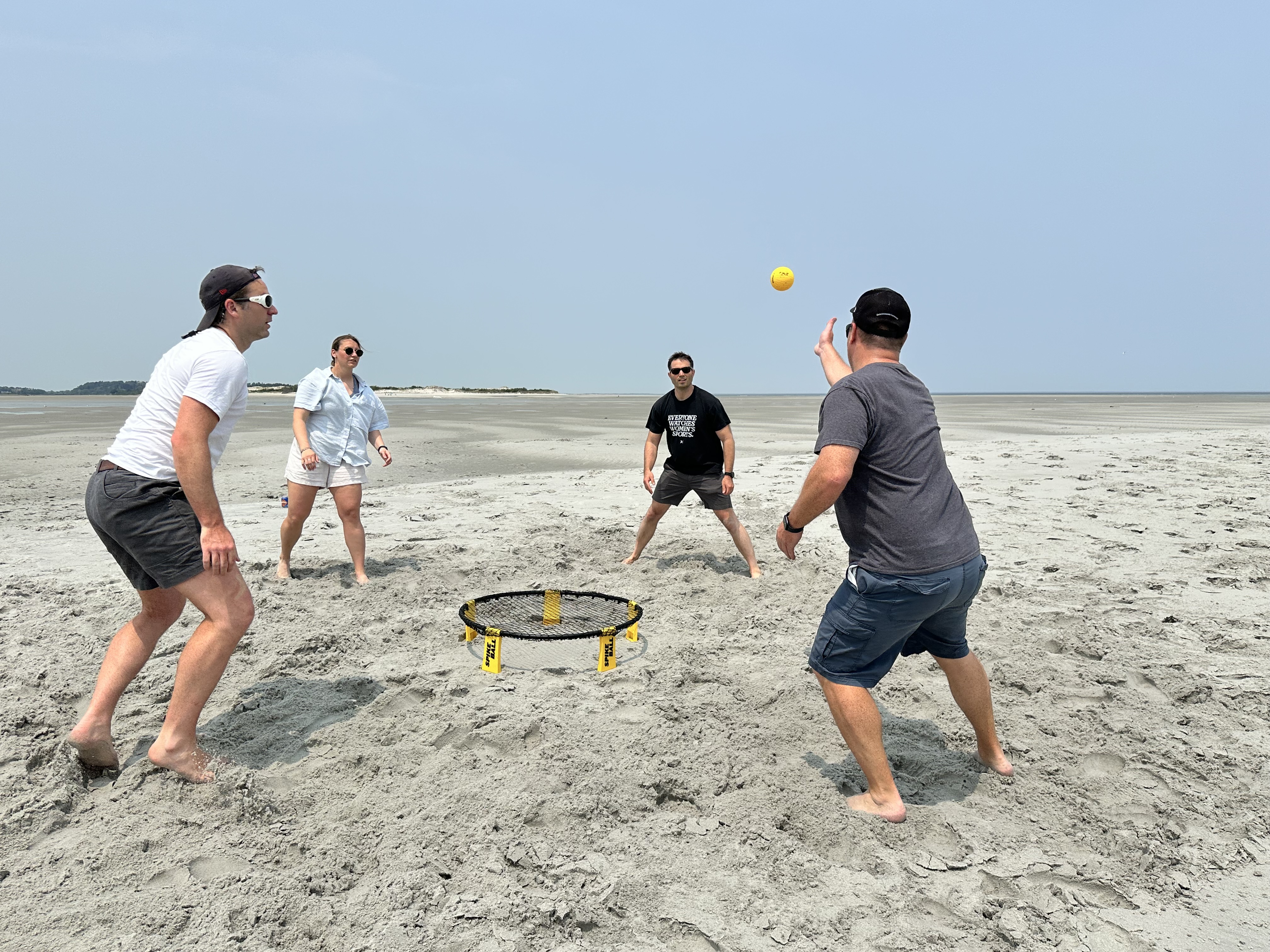 Team members playing a team building game