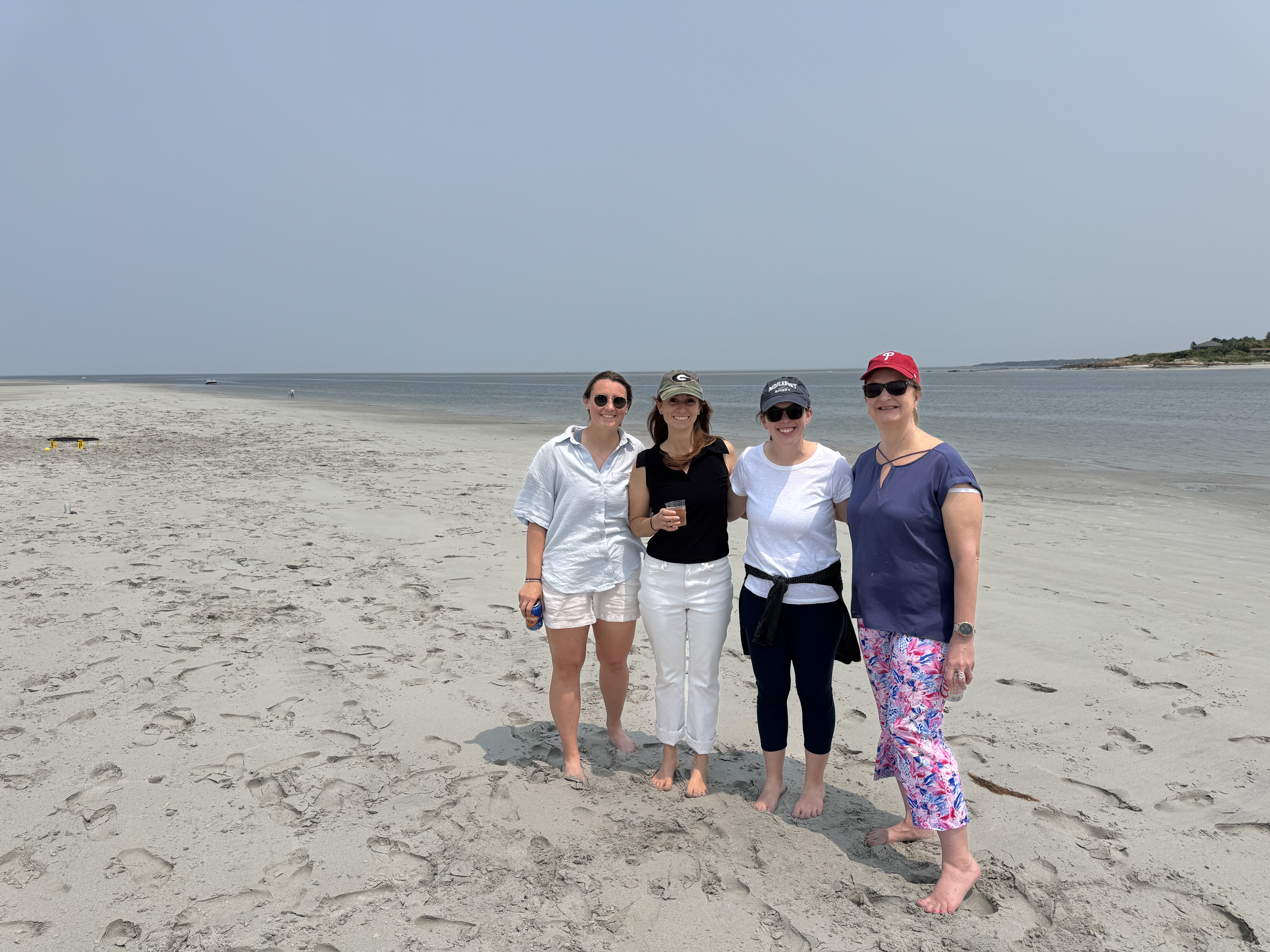 Team members at the beach